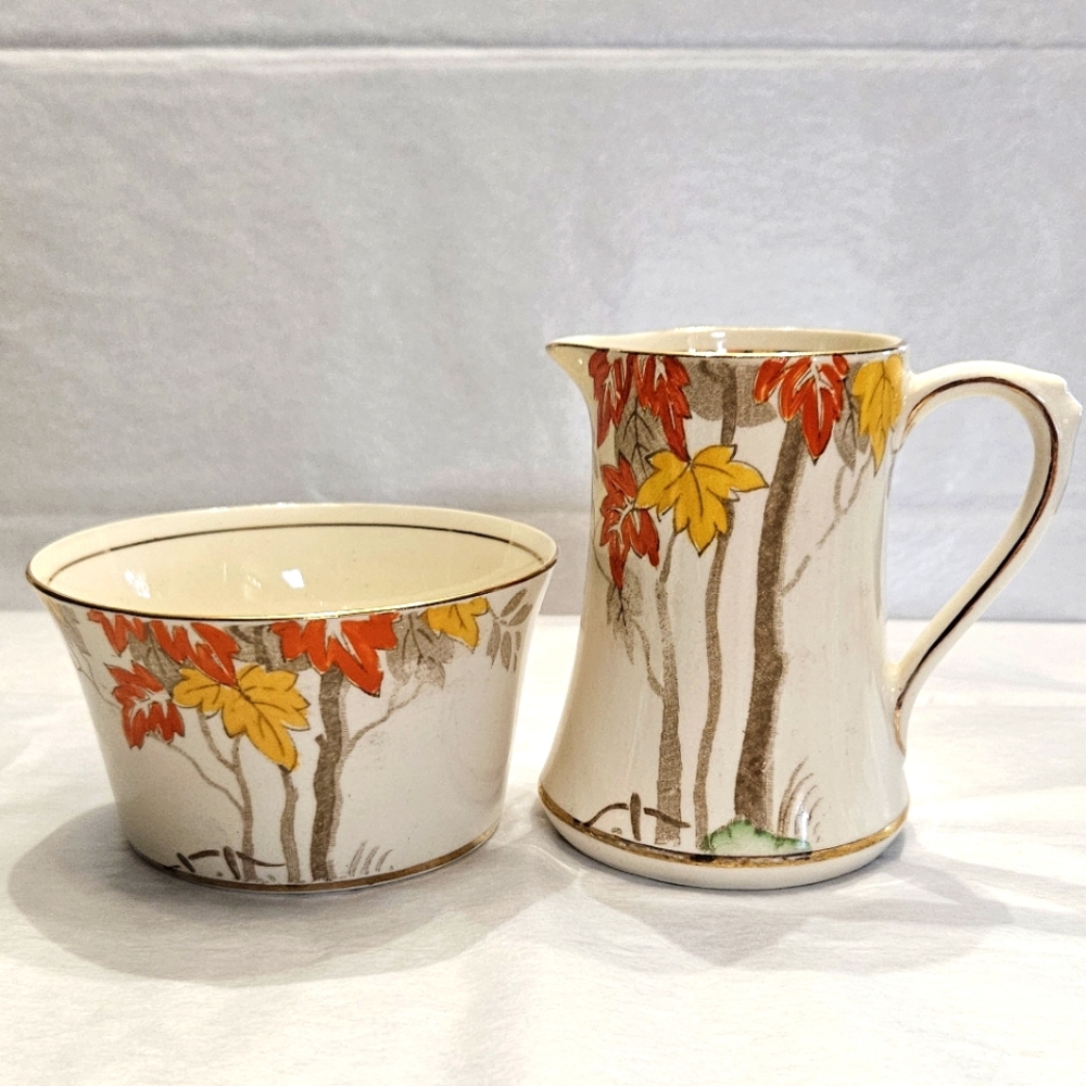 Lovely fall colors "Trees" pattern, cream and sugar by Phoenix Ware England.